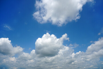 Naklejka na ściany i meble Cumulus clouds are puffy clouds that sometimes look like pieces of floating cotton. 