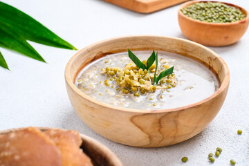 Javanese dessert porridge of mung beans with coconut milk.
