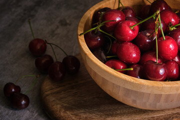 ripe cherries on a dark background