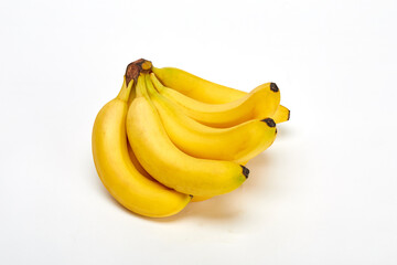 흰색 배경 위의 맛있는 노란 바나나 - obrazy, fototapety, plakaty