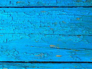 texture of old painted shabby rustic wooden fence made of planks, with rusty nails, grunge background