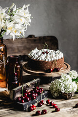 Chocolate cherry cheesecake. Romantic background.