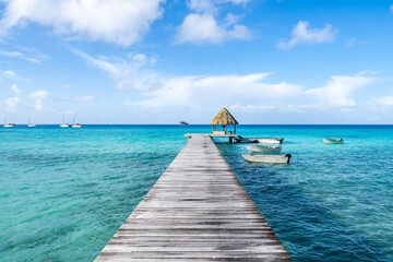 Wooden pier on a tropical island in the South Seas