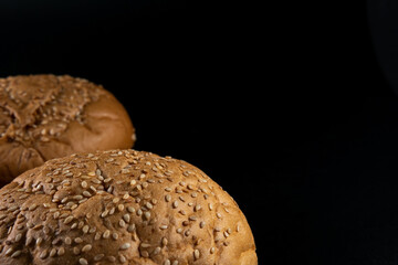 Bun, hamburger bread without ingredients. Concept for the production of fast food bread. Bakery products. Copy space