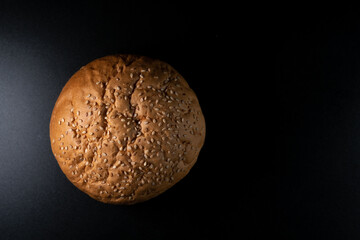 Bun, hamburger bread without ingredients. Concept for the production of fast food bread. Bakery products. Copy space. Top down view.