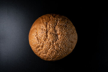 Bun, hamburger bread without ingredients. Concept for the production of fast food bread. Bakery products. Copy space. Top down view.