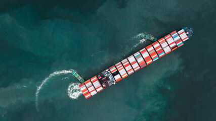 tug ship drag container cargo smart ship vessel to cargo international container yard port concept shipping by sea. © Yellow Boat