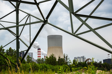 Fototapeta premium Panorama with a coal-fired power plant in Kozienice. Photo taken on a cloudy day with natural light.