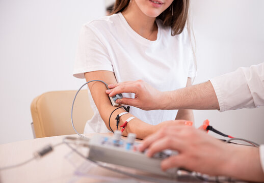 Patient nerves testing using electromyography at medical center