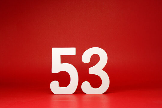 Fifty Three ( 53 ) white number wooden Isolated Red Background with Copy Space - New promotion 53% Percentage  Business finance Birthday Celebration Concept 