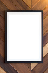 Picture frames on wood background.