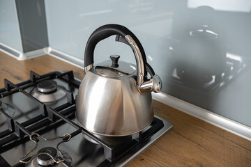 Kettle on a gas stove. Teapot