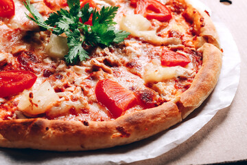 Tasty pizza in delivery box, close up