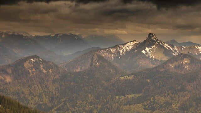 Pre alps mountains bavaria germany dramatic rainy clouds montain nature landscapes time lapse.