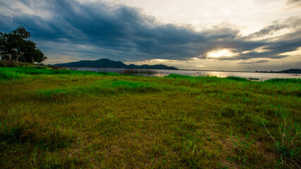 The background of Lanscape (fields, mountains, fog, trees) with intimate view. And fresh in the sight of the journey, light wallpaper of the sun in the morning.