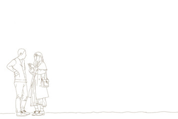 春・秋の服装で向き合うカップル