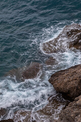 Waves crashing on rocks