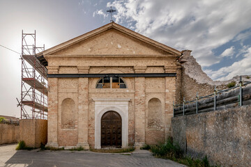 Fototapeta na wymiar The facade of the ancient Church of Sant'Antonio Abate, badly damaged by the 2016 earthquake, Norcia, Italy