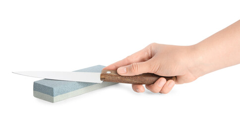 Woman sharpening knife on white background, closeup