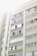 New house. Colored high-rise building. Apartment house. New building. 