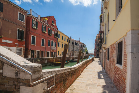 Empty embankment (fondamenta de ca Bragadin) of the canal des Saints Guy et Modeste (Rio de San Vio) in Venice, sunny day