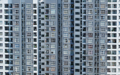 Fototapeta na wymiar Amazing front of high rise building with many apartment house facade in straght view