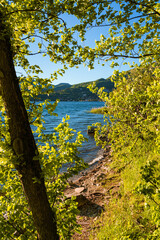 Spring sunset on the shores of Lake Pusiano, near the town of Bosisio Parini, Italy - May 2021.