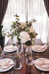 Dining room with large glass windows in a luxury style house