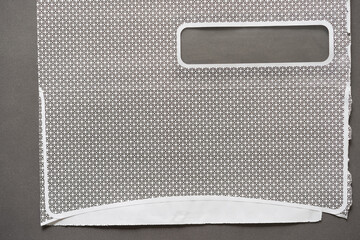 security envelope or envelope roughly split open to reveal the curious cross-hatched design or pattern inside