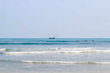 Photo of Industrial fishing boat. Fishing boat in the sea. The fishing industry in India. Indian traditional fishing boat.