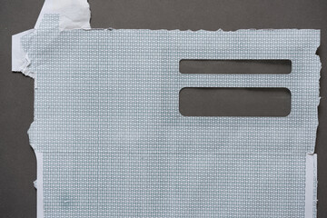 security envelope or envelope roughly split open to reveal the curious cross-hatched design or pattern inside