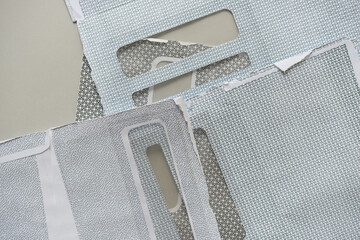 security envelopes or envelopes roughly split open to reveal the curious cross-hatched design or pattern inside