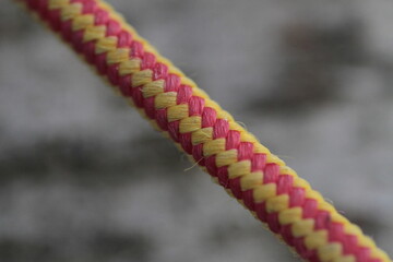 Colorful and sturdy rope used to tie things like hammocks, boats, etc.