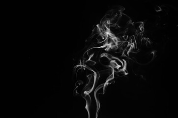 abstract fragment movement of white smoke on black background.