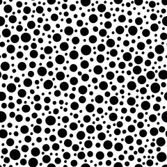 Dalmation dot vector seamless pattern background. Backdrop texture with dense scattered polka dots. Monochrome mixed circles repeat. Tossed random effect design. Shabby chic all over print, urban vibe