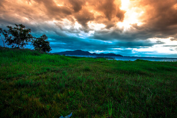 The background of Lanscape (fields, mountains, fog, trees) with intimate view. And fresh in the sight of the journey, light wallpaper of the sun in the morning.
