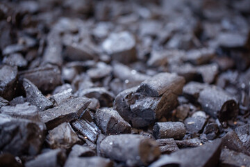 Close up shot of charcoal on the ground.