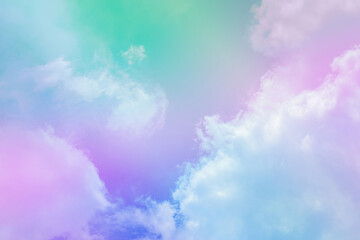 beauty abstract sweet pastel soft green pink with fluffy clouds on sky. multi color rainbow image. fantasy growing light