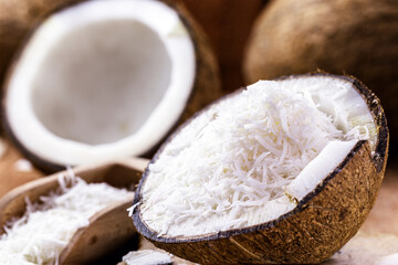 halved coconut stuffed with grated coconut, culinary ingredient
