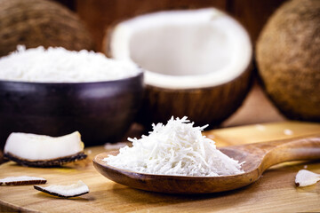 grated coconut wooden spoon, coconut-based ingredient
