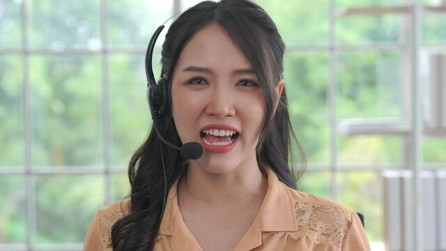 Video call camera view of businesswoman talks actively in videoconference . Call center, telemarketing, customer support agent provide service on telephone video conference call.