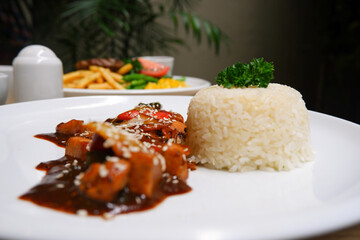 Chicken black pepper and white rice. Delicious food