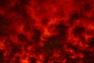 Phantasmagorical vivid colorful cloudscape at sunset time. Abstract nature background.