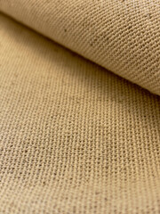 Antique style canvas texture folded fabric background