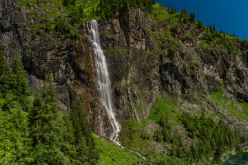 Fototapeta na wymiar Schleierfall waterfall near Sportgastein place between big mountains