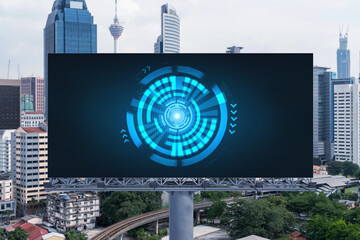 Technology hologram on billboard over panorama city view of Kuala Lumpur. KL is the largest tech...