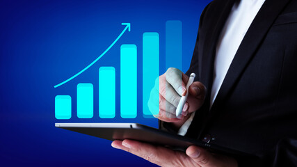 Financial graphs and charts on blurred business background. Invesment and trading concept