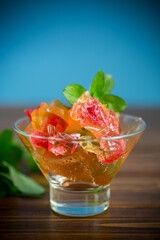 colored sweet fruit jelly in a glass glass