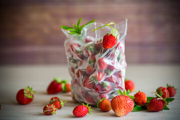 frozen fresh strawberries in a vacuum bag