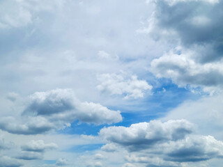 White clouds in blue sky with copy space